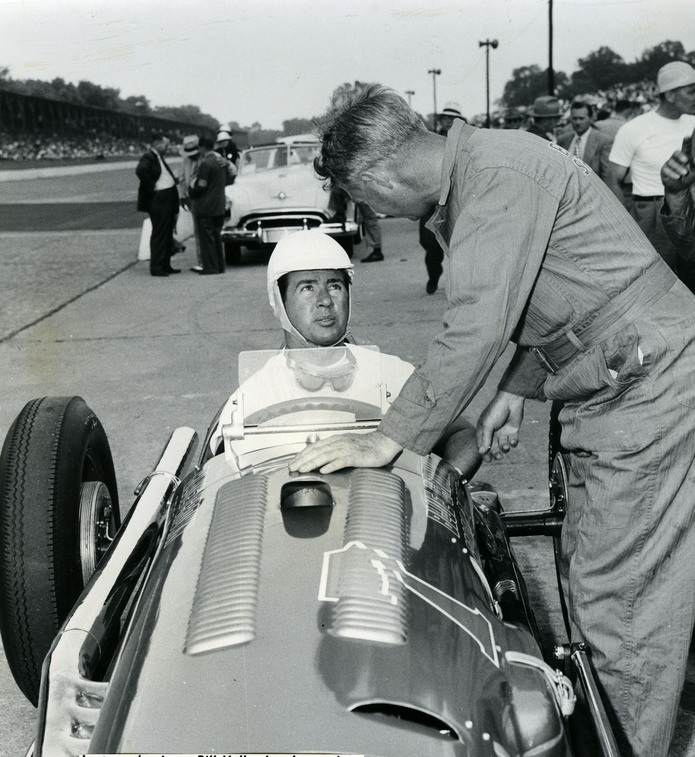 Bill Holland speaks to car owner Lou Moore on pit road during practice for the 1949 Indianapolis 500. Holland drove Moore's No. 7 Blue Crown Special. (Photo courtesy: Indianapolis Motor Speedway)